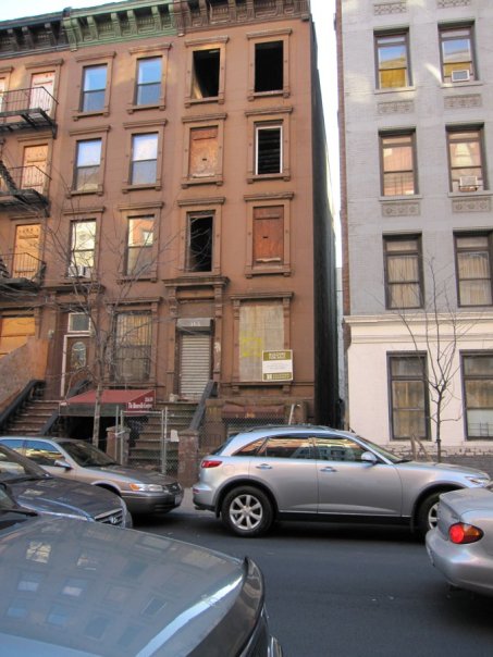 Front of 168 West 123rd Street - A Harlem brownstone shell