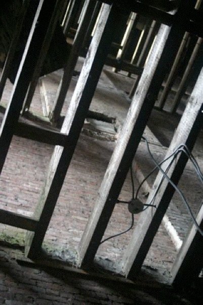 Interior of a gutted townhouse shell in Harlem