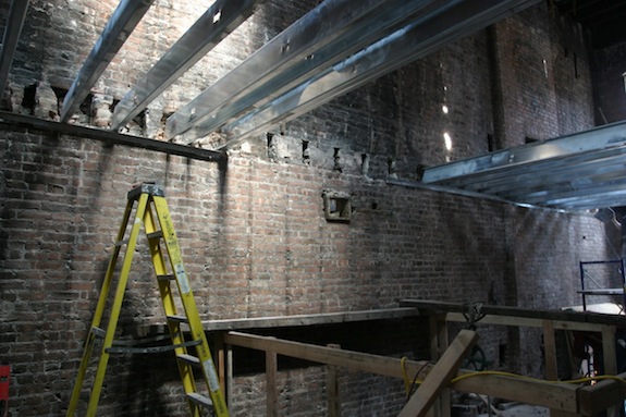 Metal joists going into an old brick wall