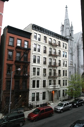 View of 'The Shakespeare' and two other buildings on 123rd Street