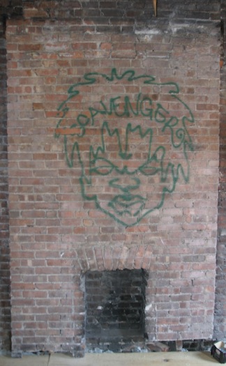 Scavenger graffiti in an abandoned Harlem townhouse