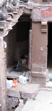 Two entrances under brownstone stoop
