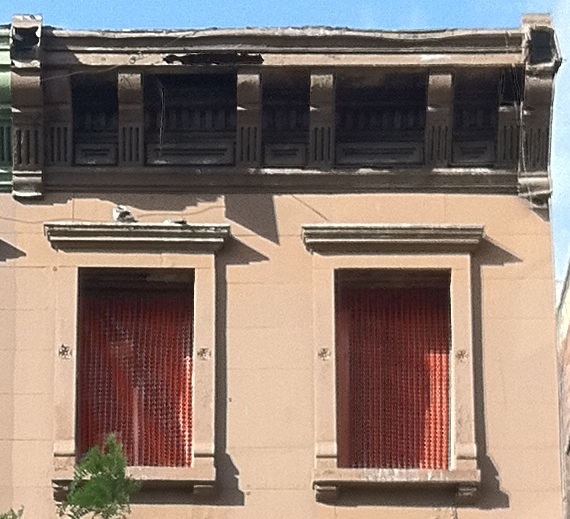 Windows with orange safety netting