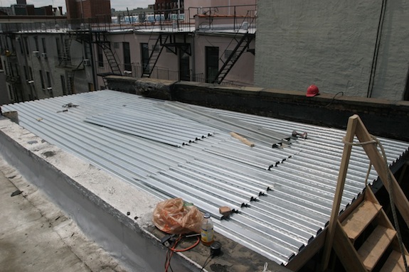 Metal decking for a Harlem townhouse roof