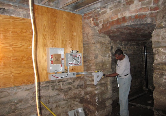 Electrical meters going into cellar near vault room