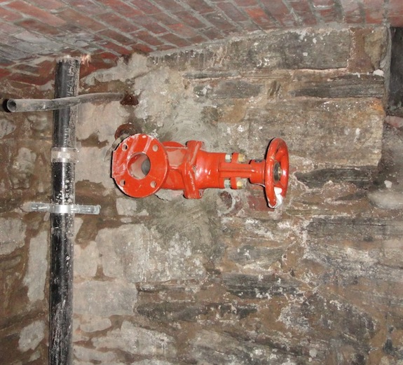 valve at water connection into brownstone