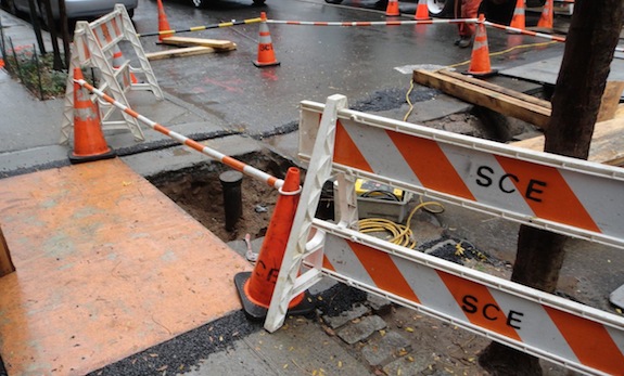 ConEd contractors tear up street & sidewalk