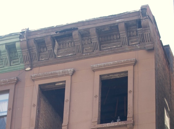 Crumbling cornice on Harlem Townhouse