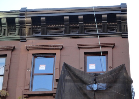 Restored cornice on Harlem brownstone