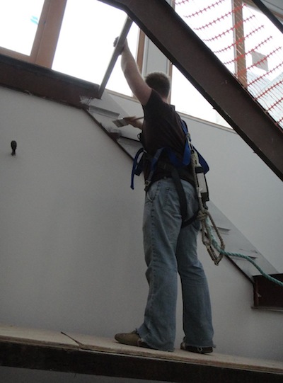 Ryan painting stairs