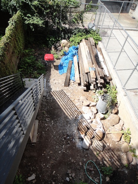 messy back yard of Harlem townhouse